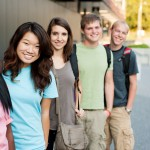 Group of teens standing in a line outside